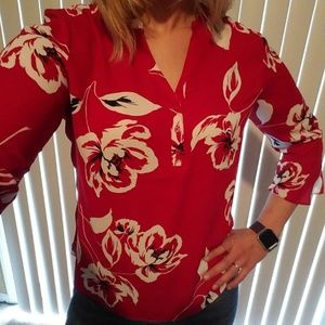 red floral blouse